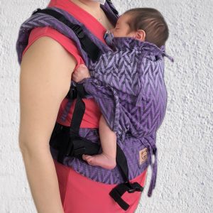 Newborn baby just a few days old in Luna Dream buckle carrier